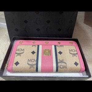 MCM zip wallet. Brand new. Never used. In MCM box